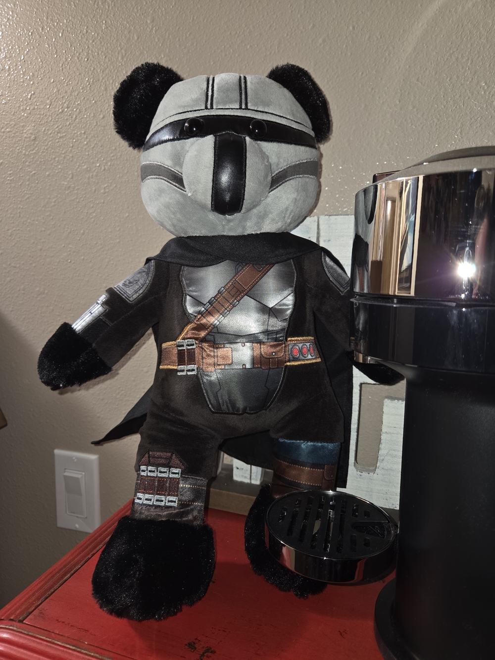 The Mandalorian Build-A-Bear plush featuring a masked silver-and-black helmet